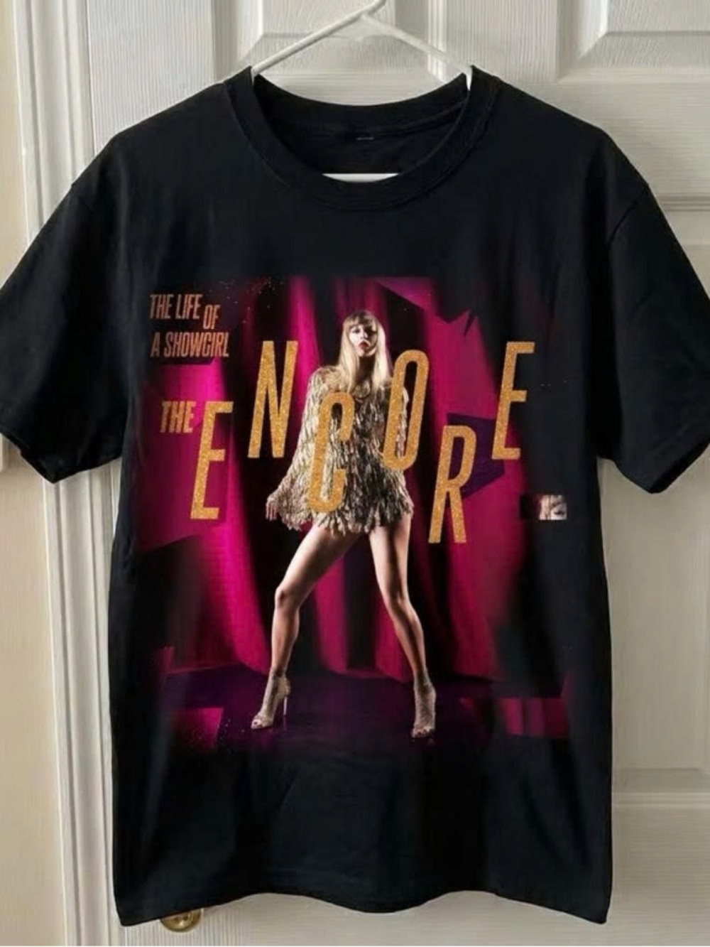 Vintage Black Tee with Pink Stage and Gold Text 'The Encore'